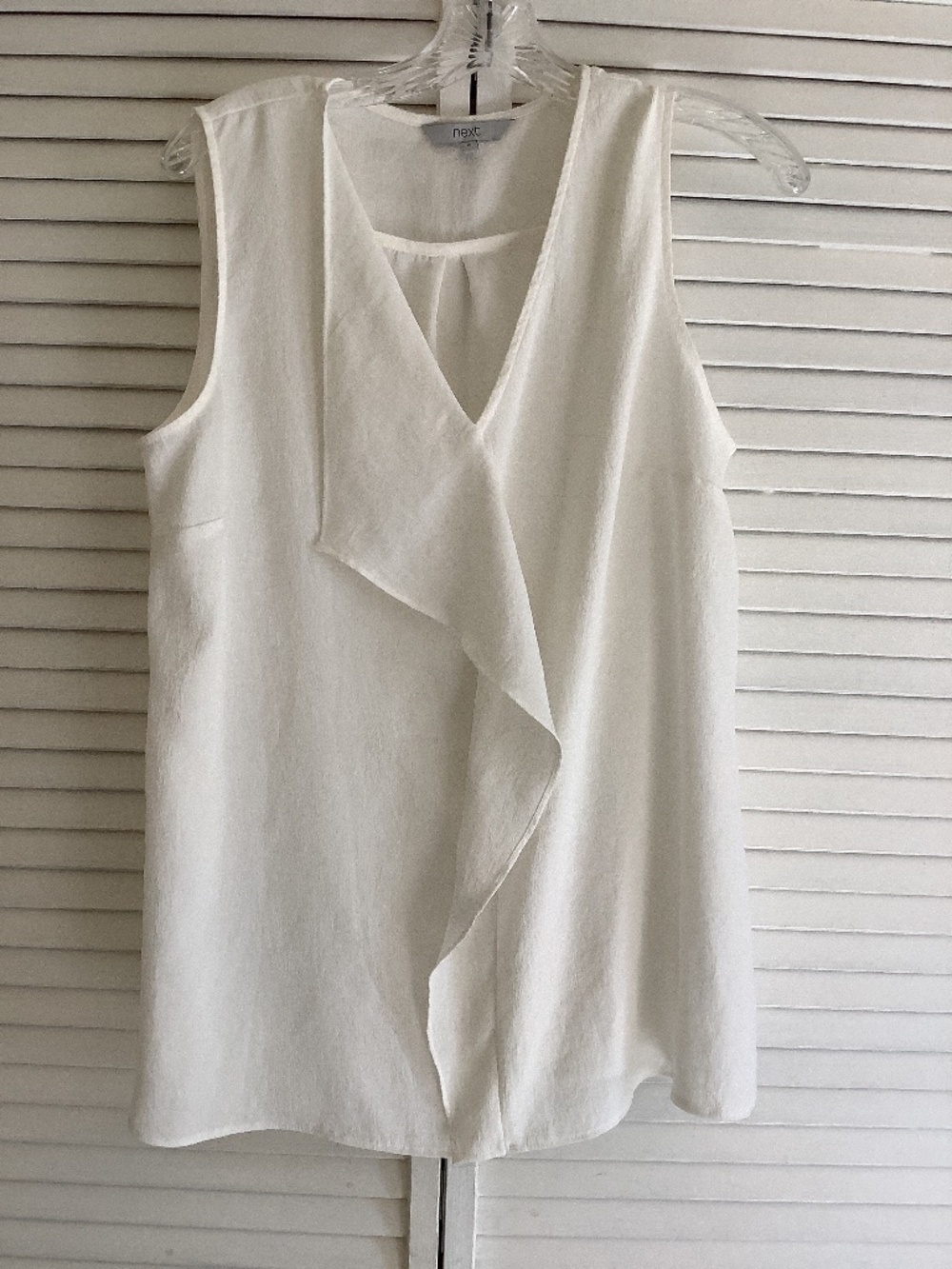 Womens Slinky Crepe Polyester Sleeveless Top with V Neck and swag front